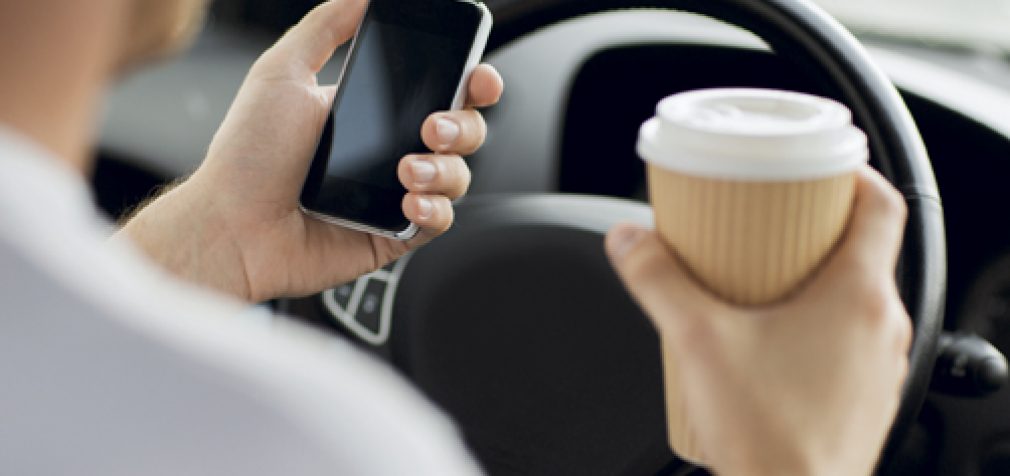 THE RISK OF DISTRACTED DRIVERS