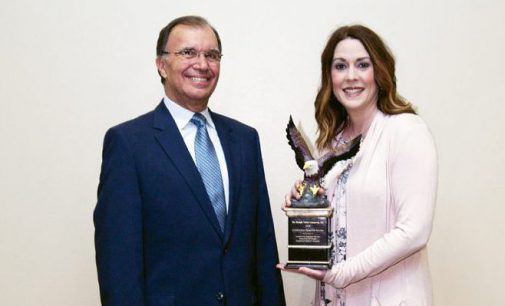 COMMUNITY SERVICE AWARD WINNER “TAKES ON” AN ENTIRE STATE