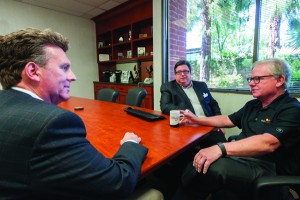 Wayne Dennen (left), who heads up the agency’s financial services department, and Jerry meet with client Bill Ross, co-owner of Bar Bakers, LLC, one of the largest private contract-manufacturing operations in the nation producing nutritional cookies, wafers and bars.