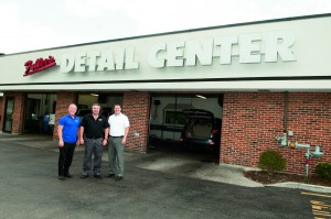 Jim Smith (left) and Scott M. Elmlund (right), Commercial Lines Manager, visit with Michael Fuller of Fuller’s Carwash & Car Care. Gnade Insurance has become the “premier car wash insurance agency in the Chicago area, insuring more than 100 car washes in Illinois, Indiana and Wisconsin.”