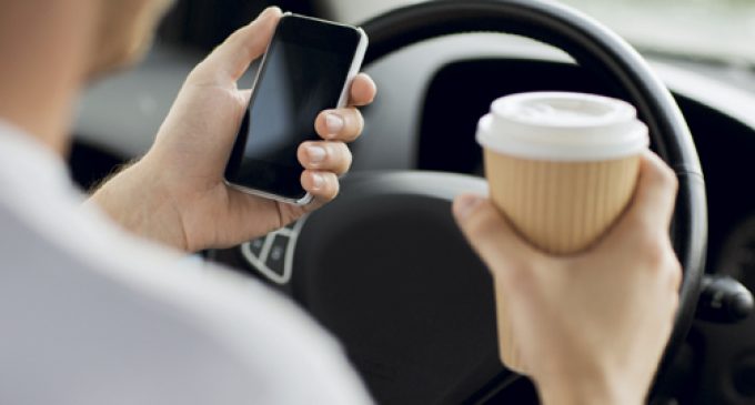 THE RISK OF DISTRACTED DRIVERS